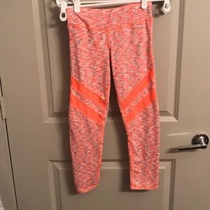 Bright pink leggings with mesh detail